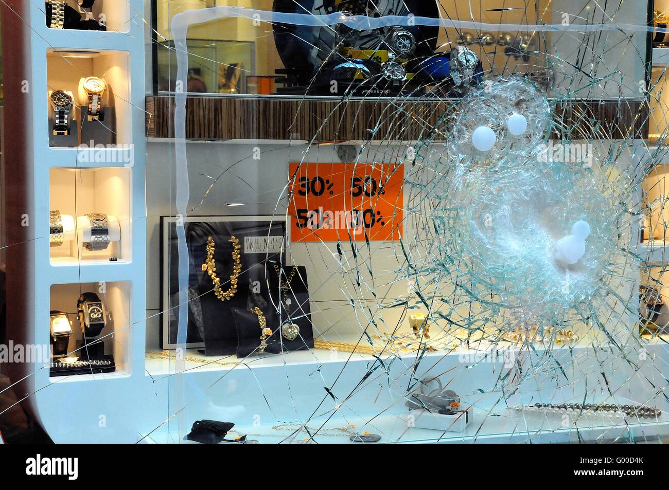 Smashed window of a jewelry store Stock Photo