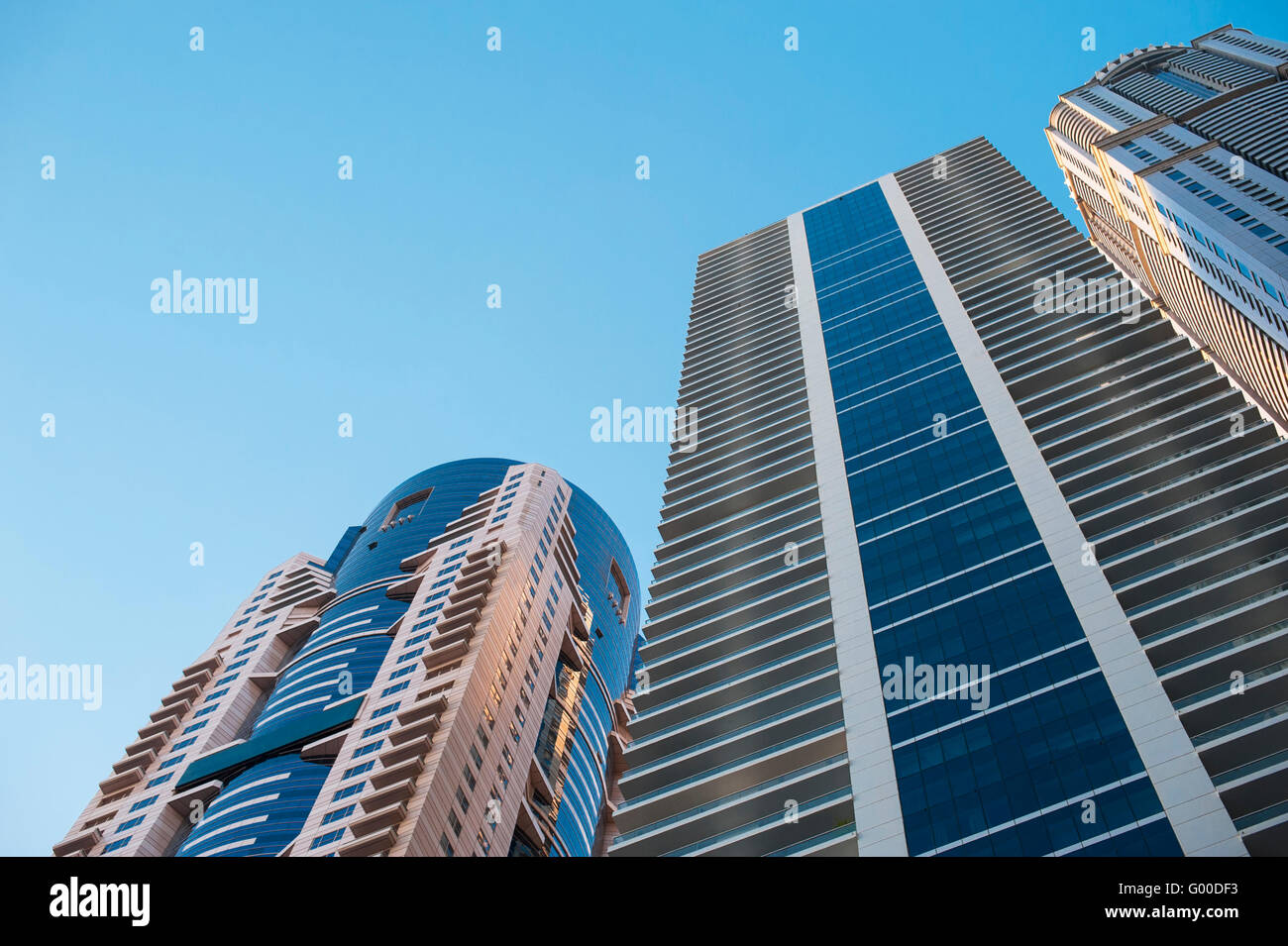 beautiful skyscrapers on blue sky background Stock Photo - Alamy