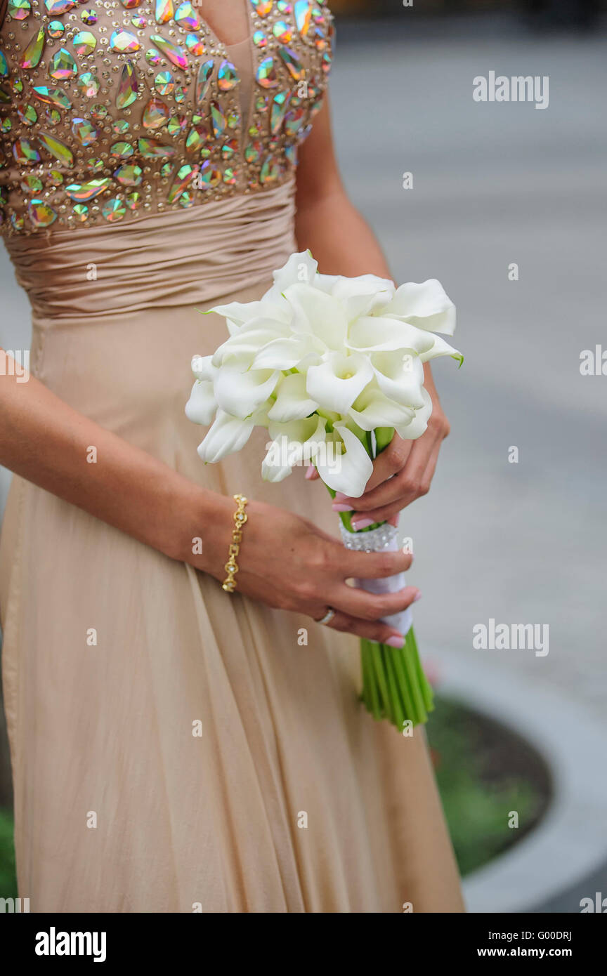 Bride hold her calla wedding bouquet Stock Photo Alamy