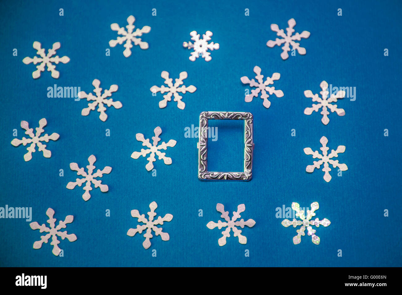 Christmas card with frame and snowflakes on a blue background Stock ...