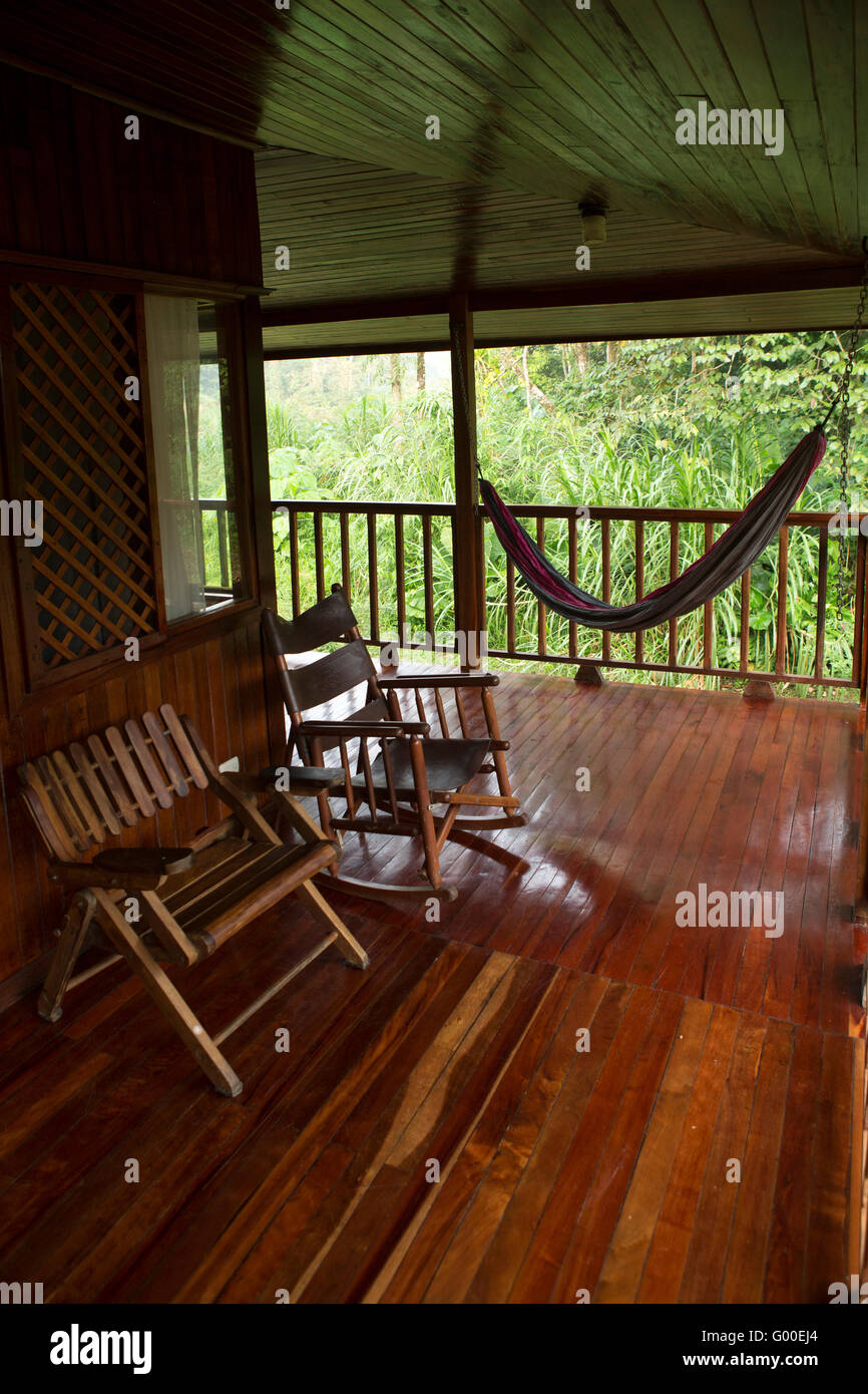 A hammock and chairs at Selva Verde Lodge at Sarapiqui in Costa Rica. The lodge with eco-credentials is located in the rainfores Stock Photo