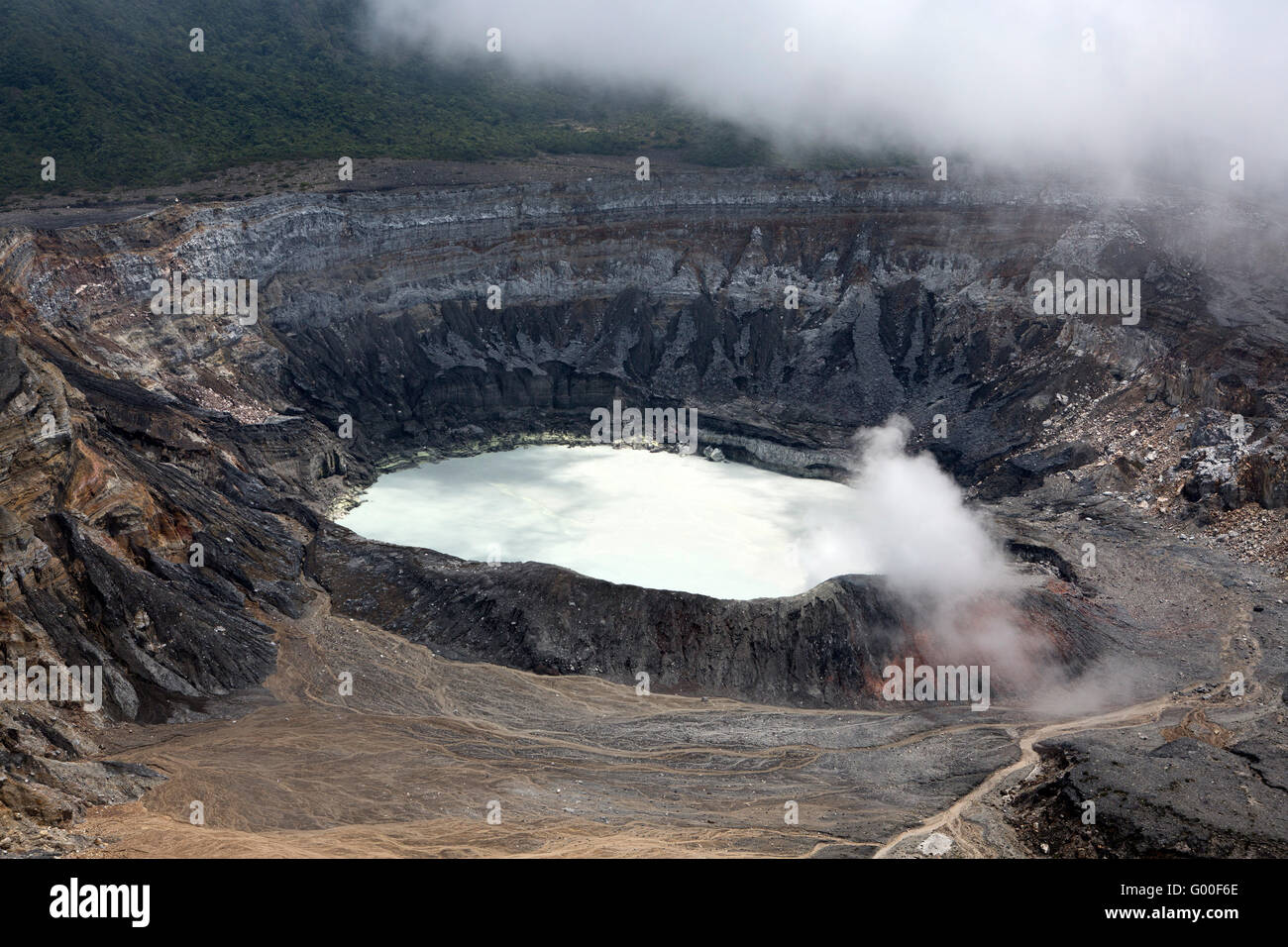 Steam and cloud at the crater of Poas Volcano in Parque Nacional Volcan Poas (Poas Volcano National Park) in Costa Rica. Stock Photo