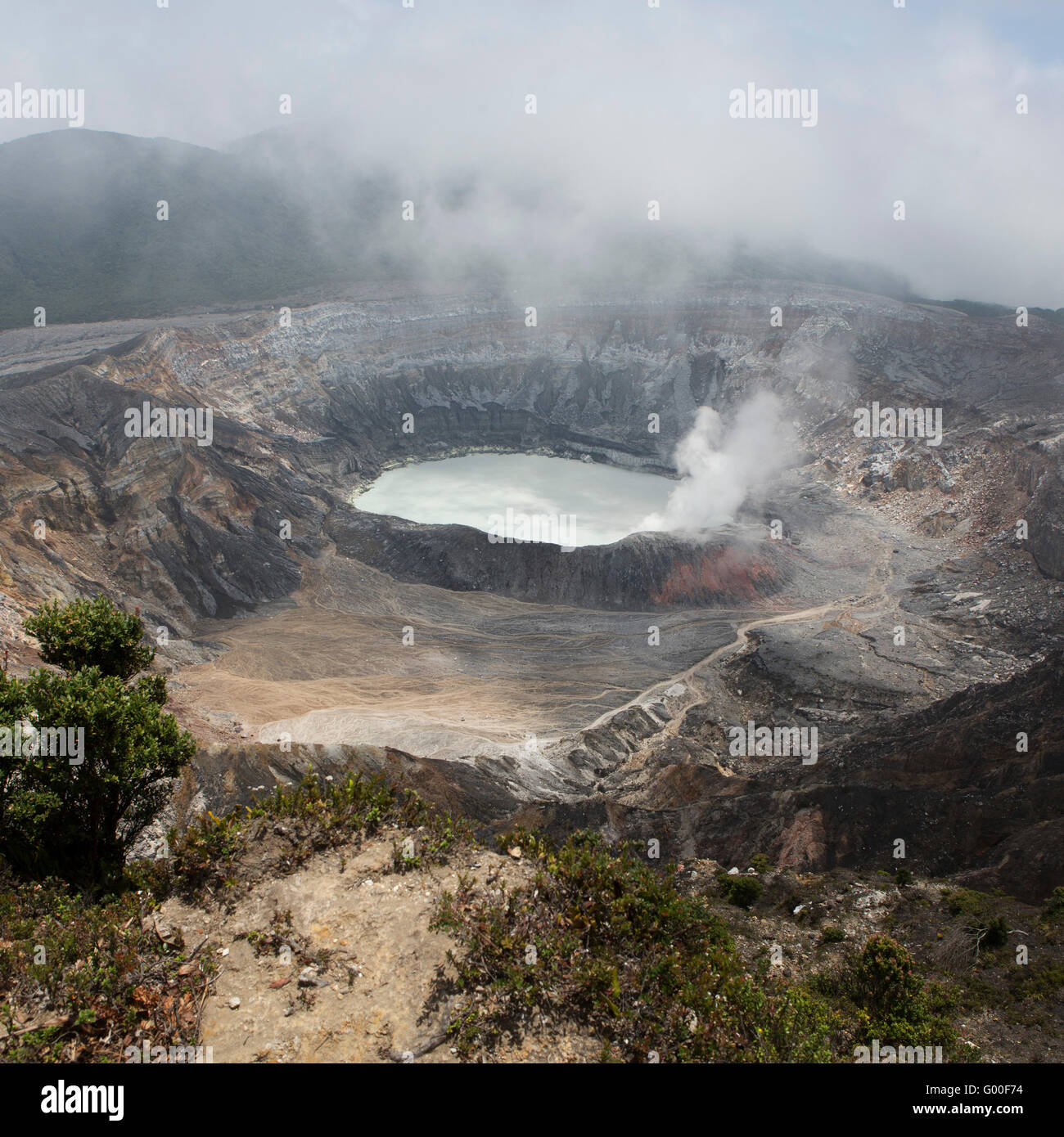 The crater of Poas Volcano in Parque Nacional Volcan Poas (Poas Volcano National Park) in Costa Rica. Stock Photo