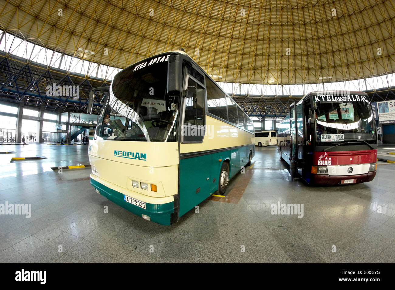 Parked coaches in the departure / arrivals terminal station. Thessalonica's KTEL intercity bus station 'Macedonia' Stock Photo