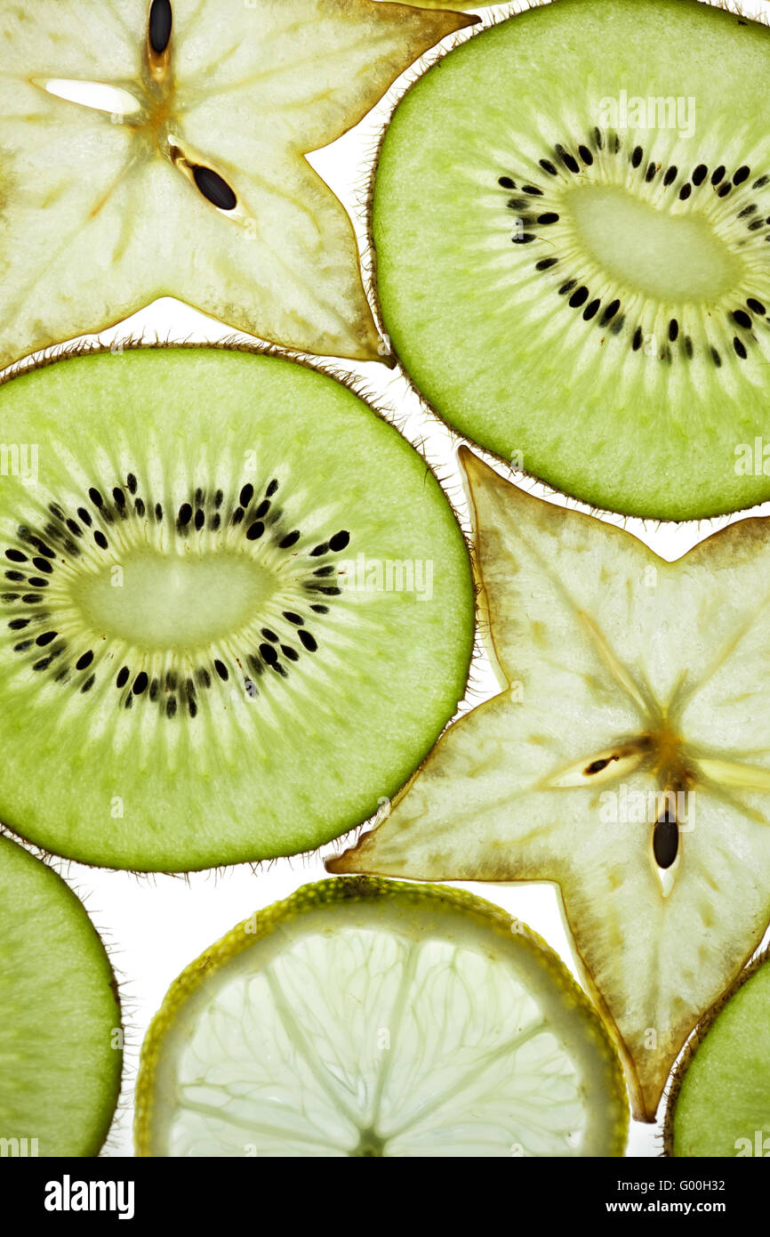 Sliced Kiwifruit, Lemon and Starfruit isolated on white Stock Photo