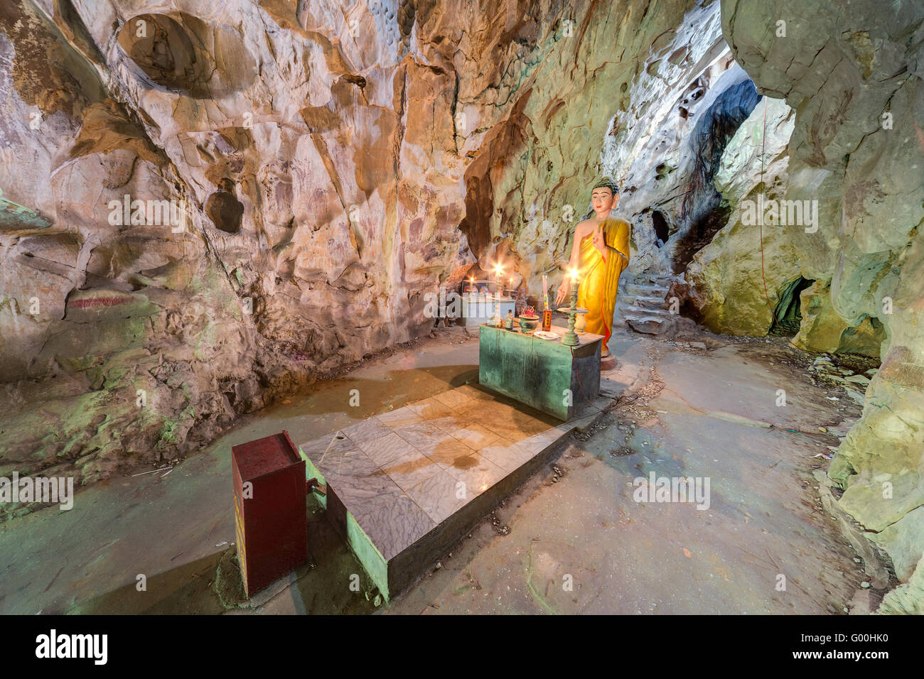 Van Thong Cave with altar and Buddha, Marble mountains, Vietnam Stock Photo
