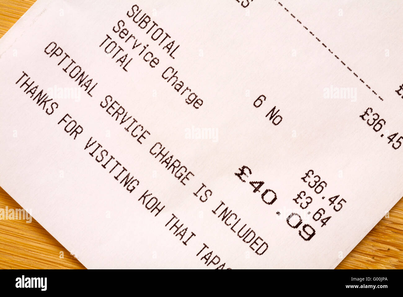 Optional service charge is included on restaurant bill Stock Photo