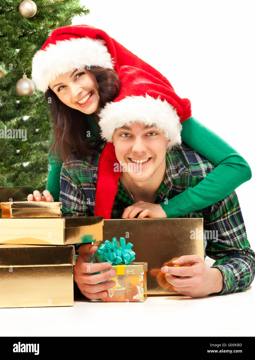 Young smiling family christmas tree hires stock photography and images