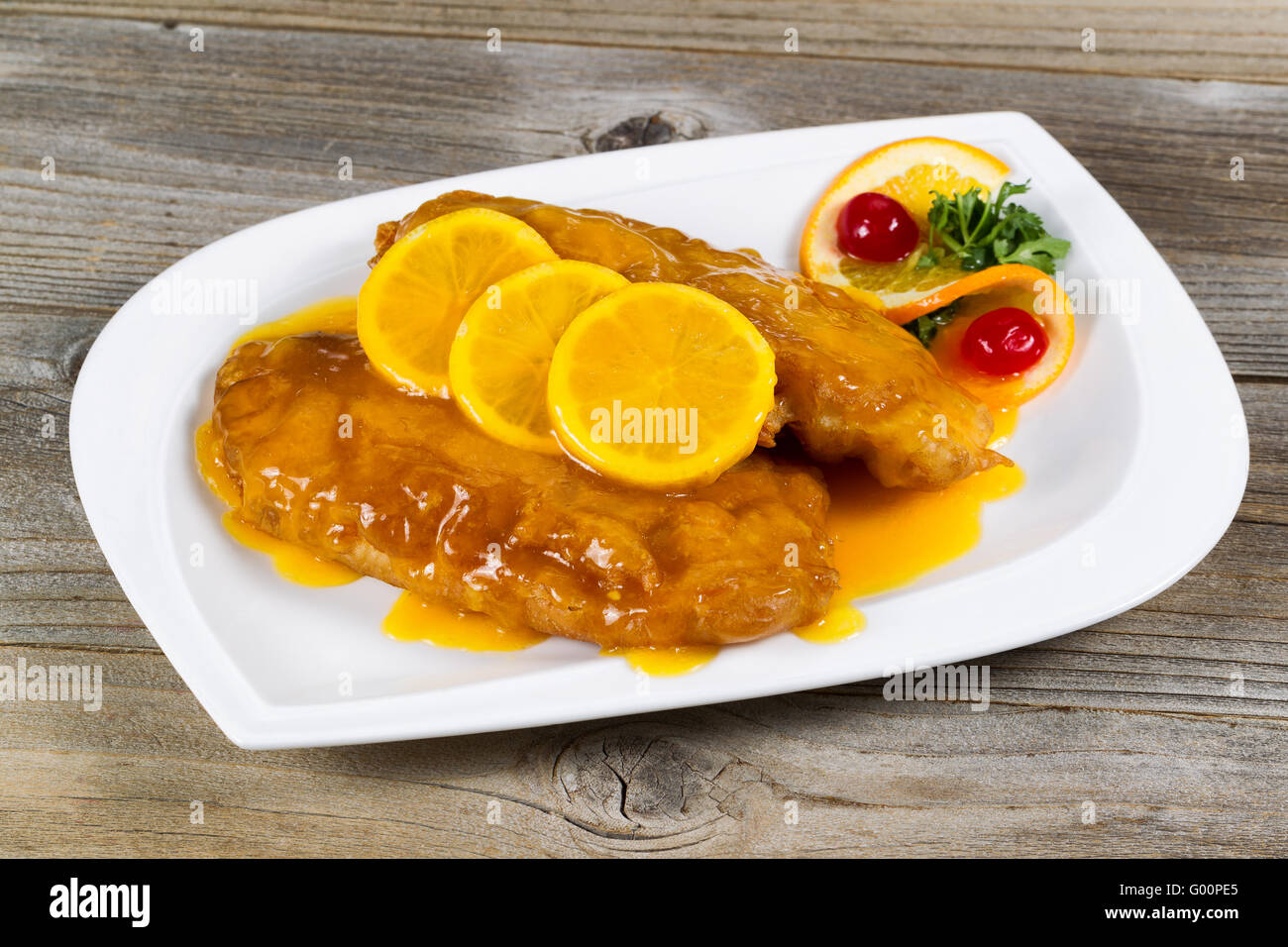 Fried chicken with lemon sauce ready to eat Stock Photo