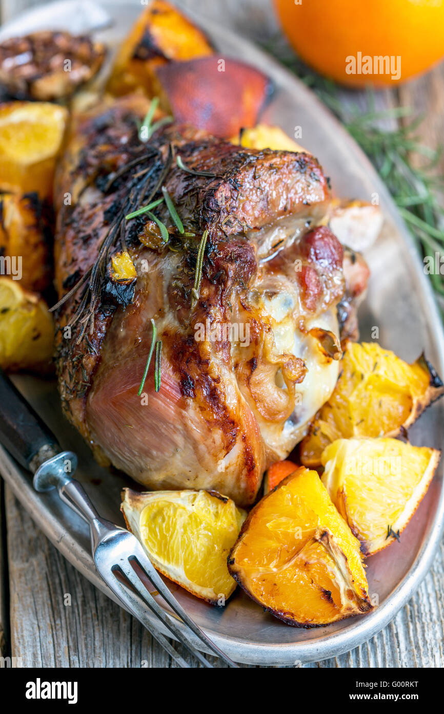 Thigh of turkey baked with oranges. Stock Photo