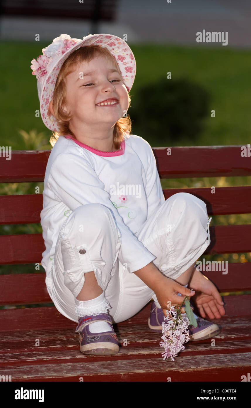 The girl in park on a bench Stock Photo - Alamy