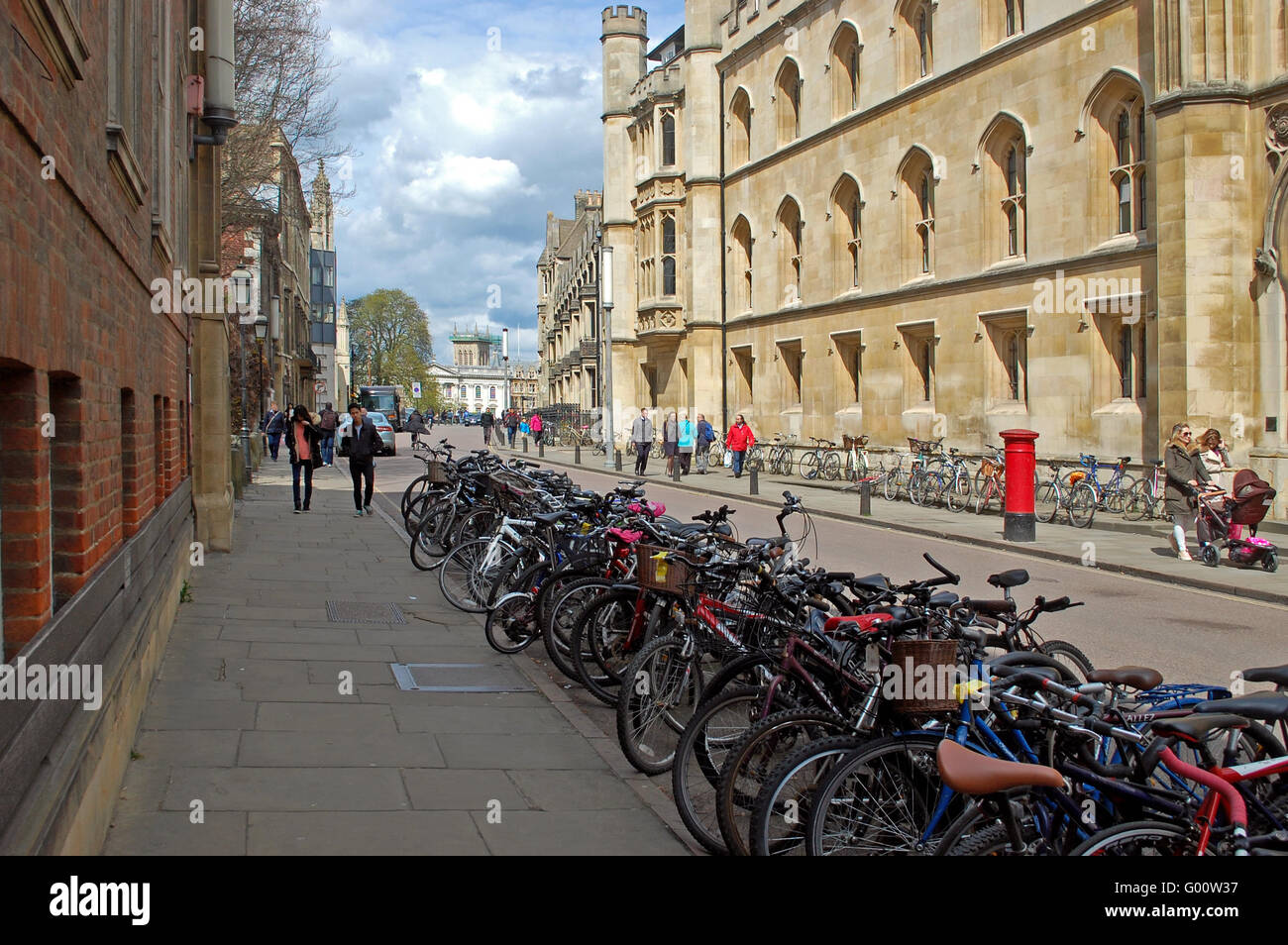 Lines of Bicycles on a Cambridge street, outside Corpus Christie College, Cambridge University Stock Photo