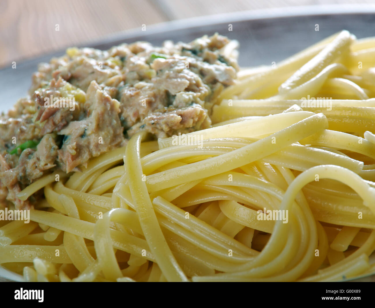Bavette pasta with tuna sauce .italian cuisine Stock Photo - Alamy