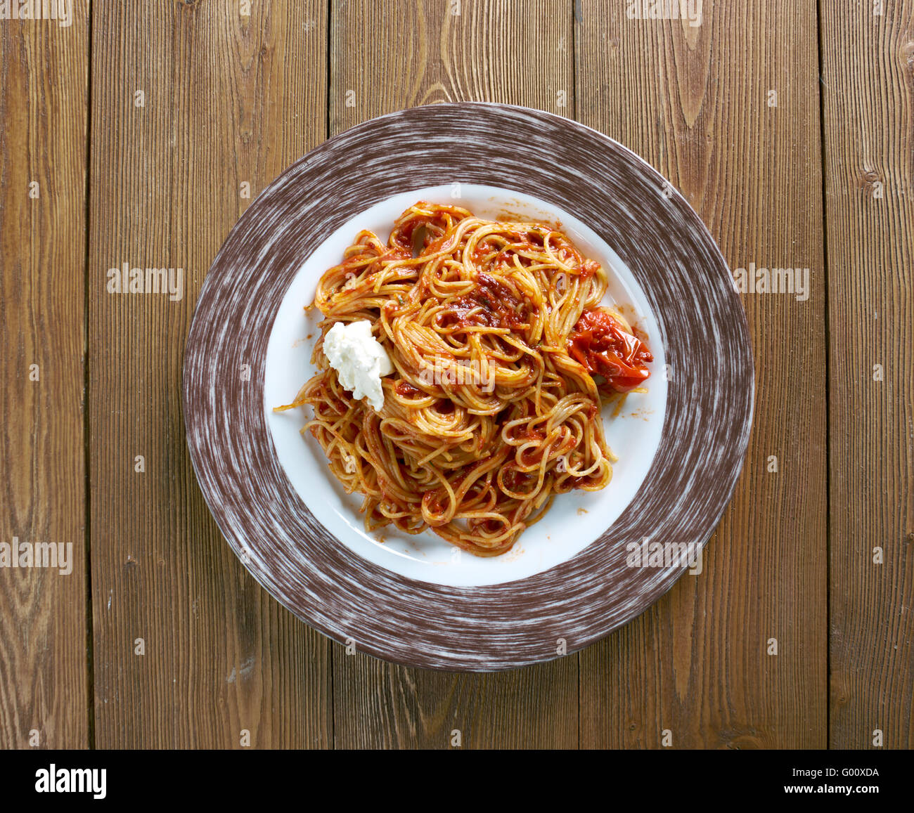 Capellini al Pesto Rosso capellini pasta Stock Photo Alamy