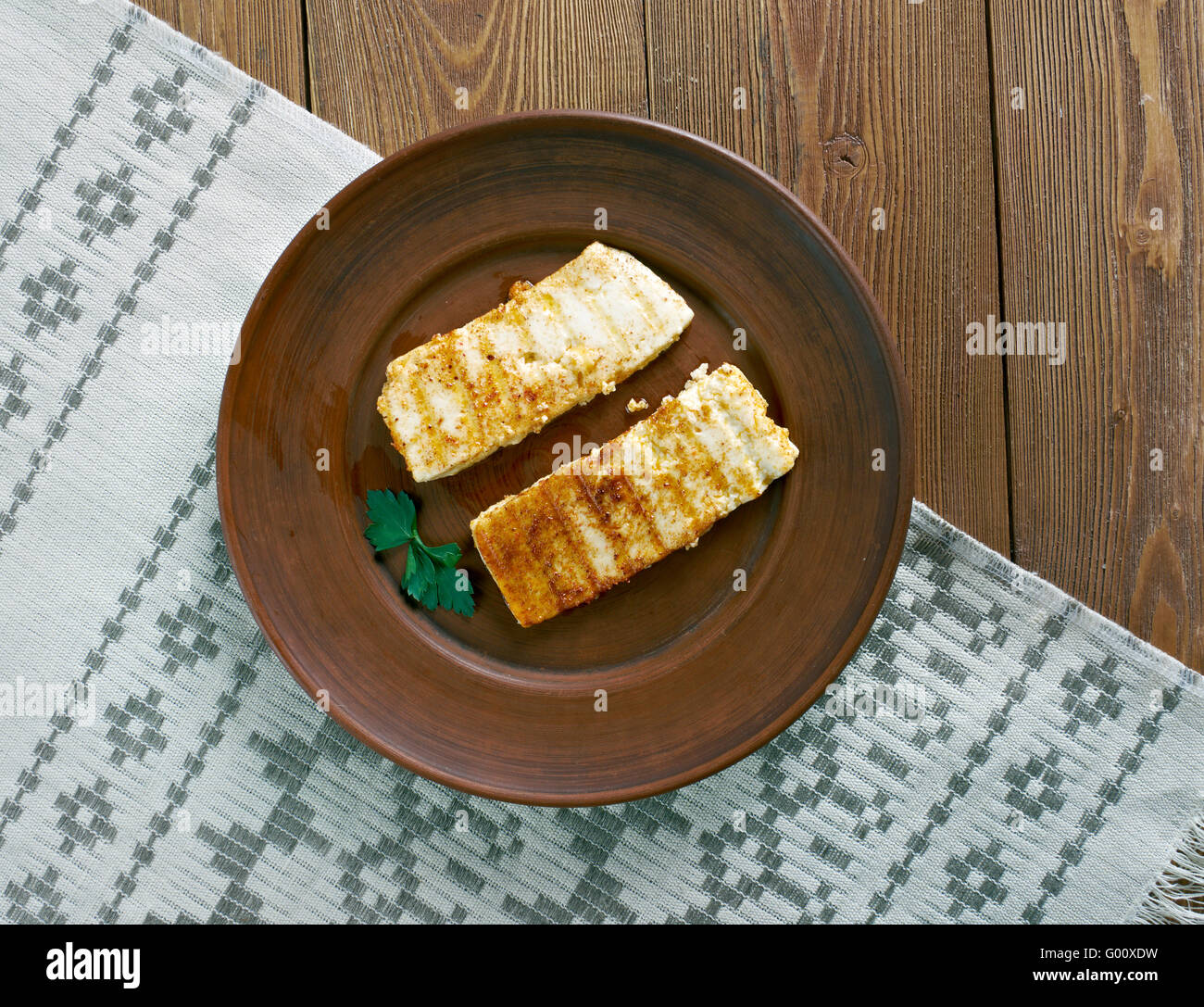Grilled  Halloumi -  Cypriot semi-hard, unripened brined cheese. popular in the Levant, Greece and Turkey Stock Photo