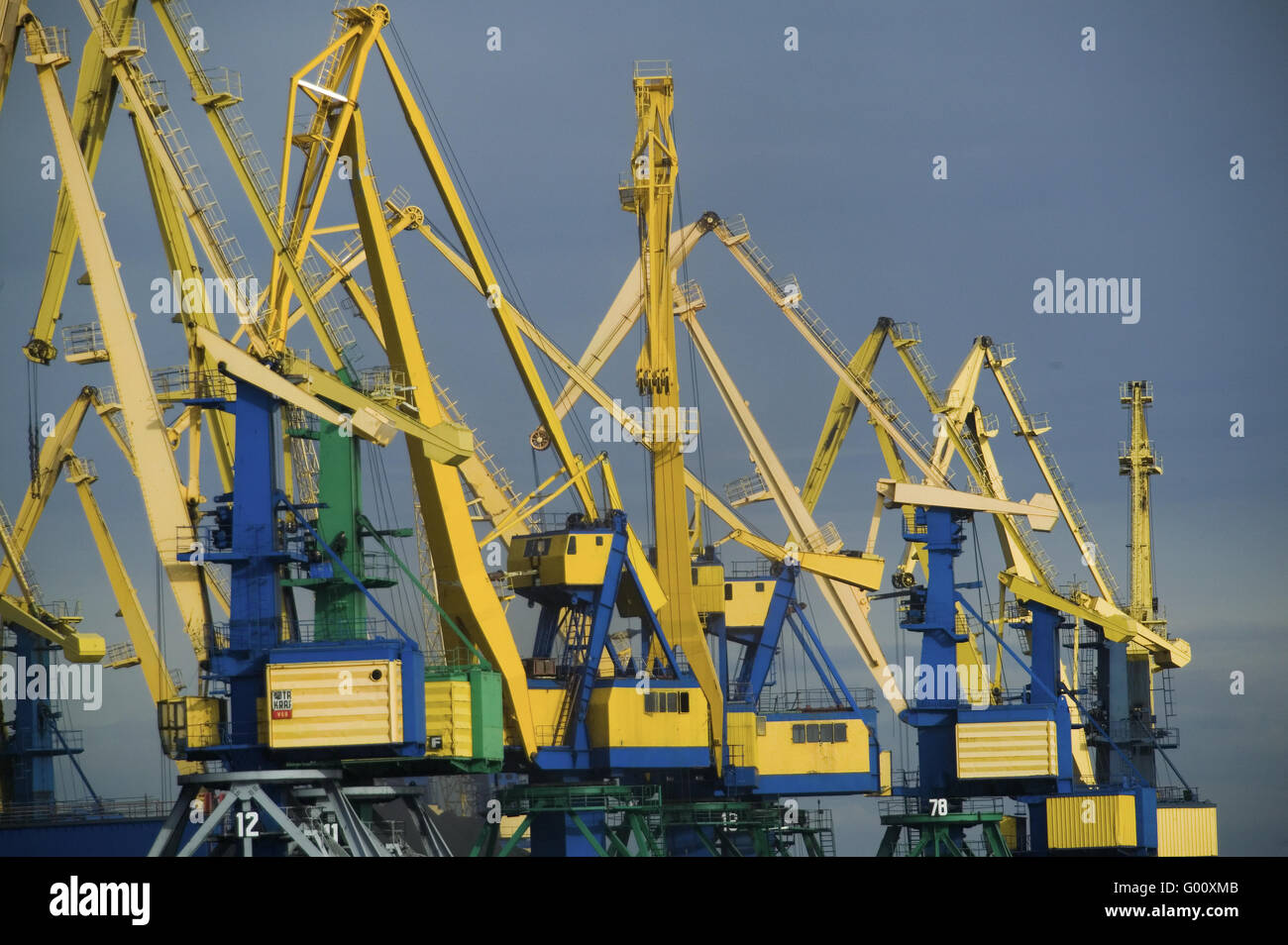 cranes in the harbour of Riga Stock Photo