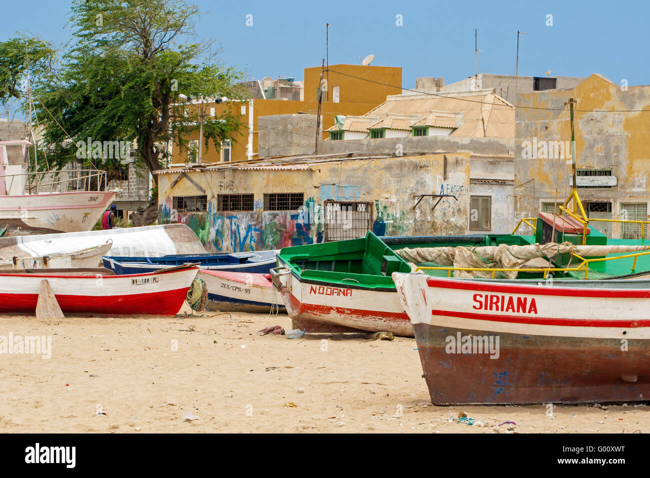 Colourful fishing boats on the beach at Sal Rei, Boa Vista, Cape Verde Stock Photo