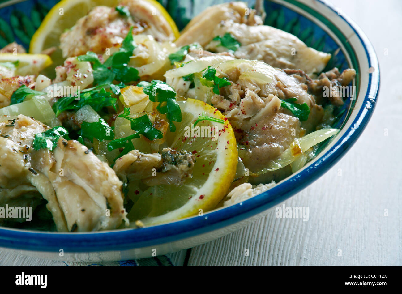 Moroccan Chicken Place the onion, parsley, coriander, lemon juice, garlic, cumin Stock Photo