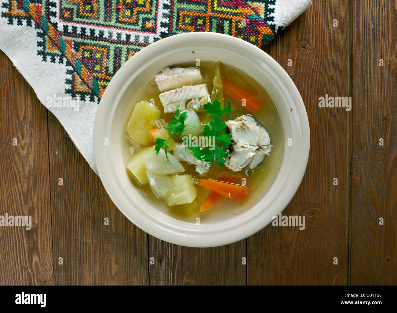 Russian fish soup royal Ukha. with cod and sturgeon in the chicken