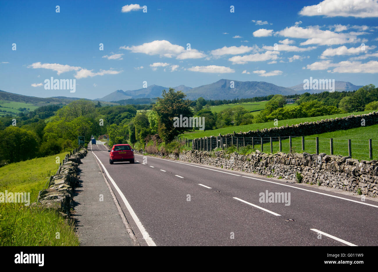 A5 road near Pentrefoelas with Snowdonia mountains in background Sunny summer day Conwy County North Wales UK Stock Photo