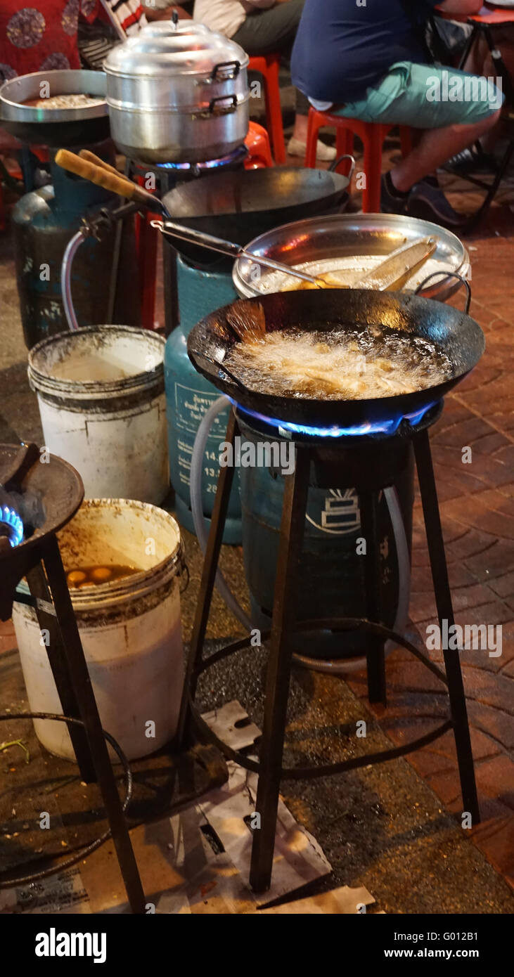 traditional asian street food cooked in a wok Stock Photo - Alamy