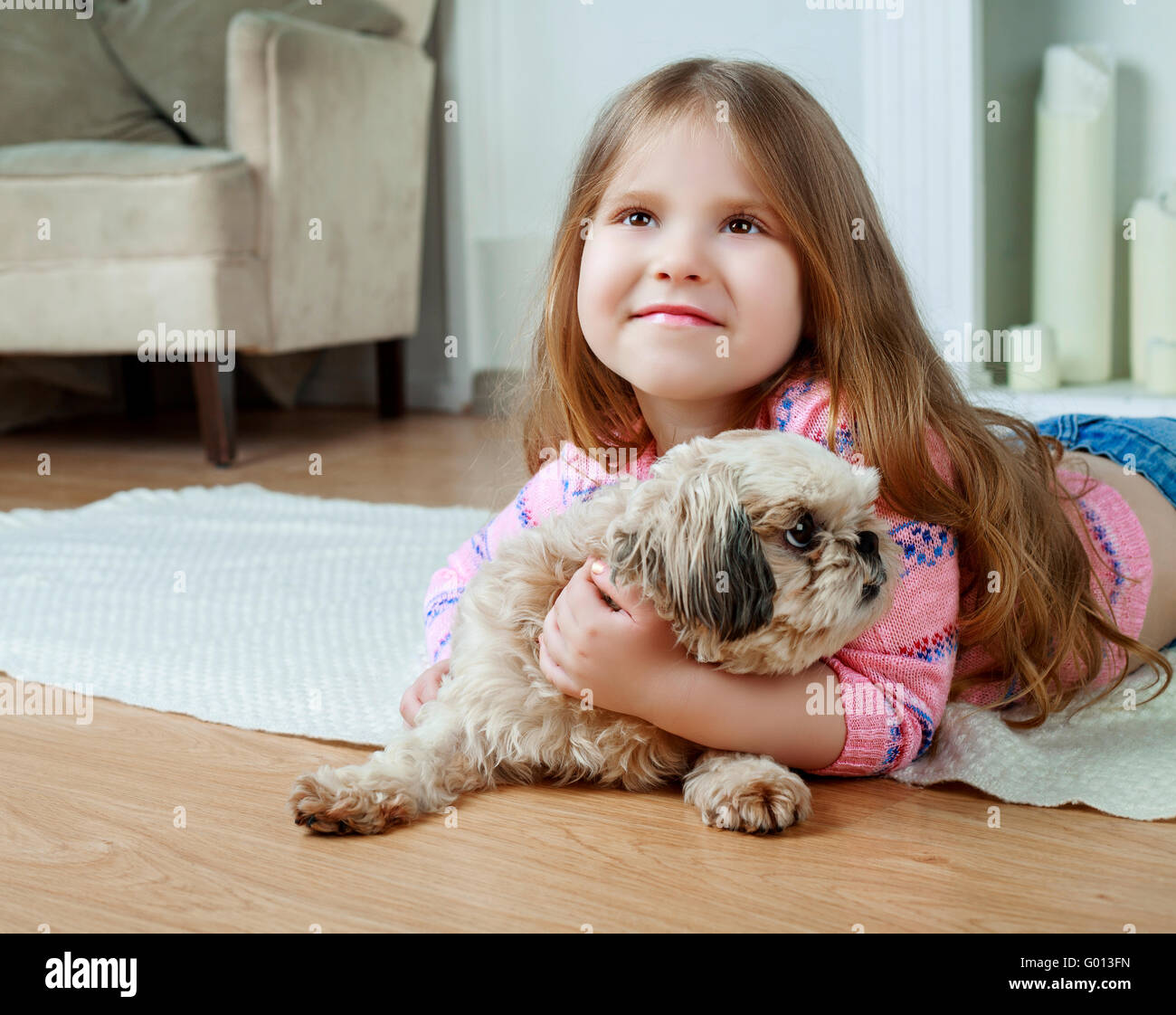 happy girl with her dog at home Stock Photo - Alamy