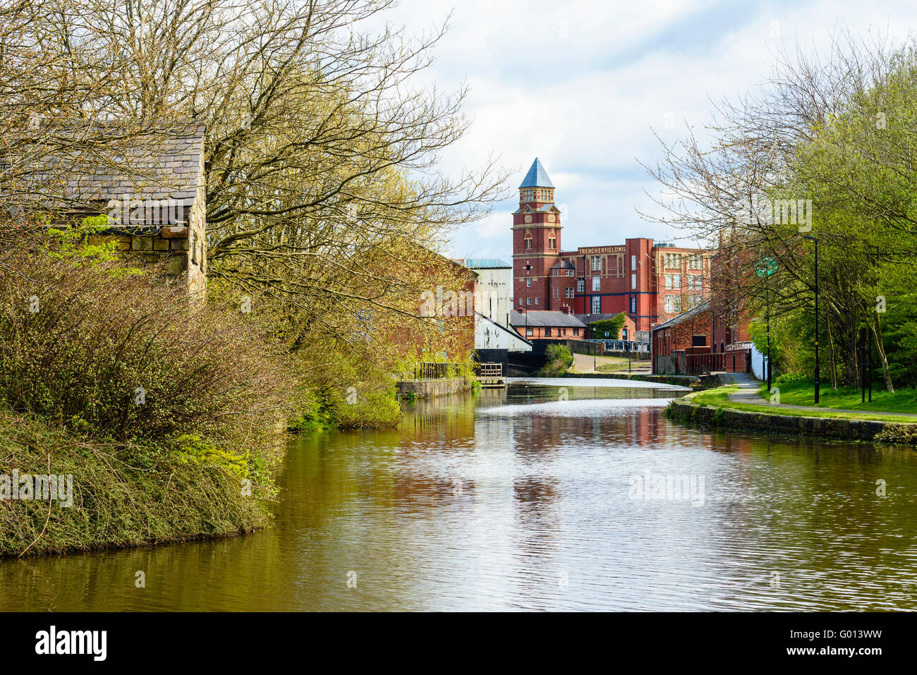 The Leeds and Liverpool Canal looking towards Wigan Pier and Trencherfield Mill in Wigan Greater Manchester UK Stock Photo