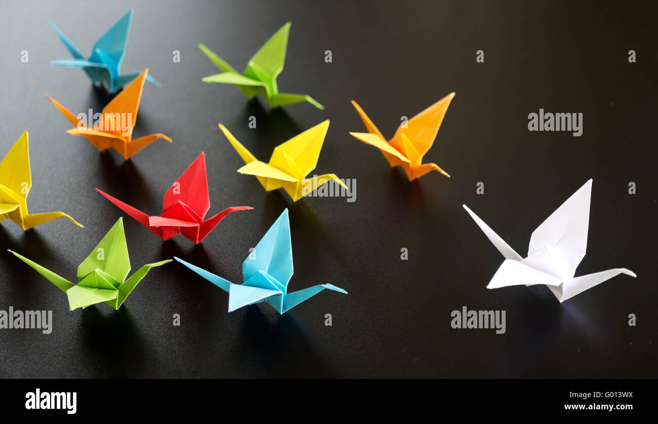 close up flying origami birds Stock Photo