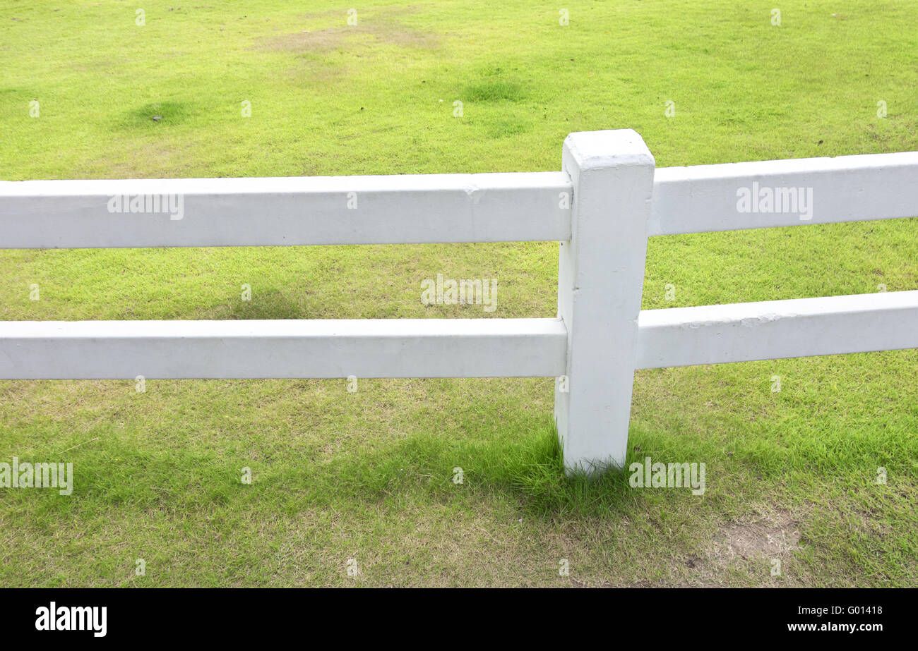 white fence and grass white fence and grass Stock Photo - Alamy