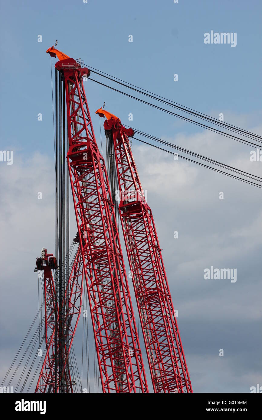 Crane picking up construction hires stock photography and images Alamy