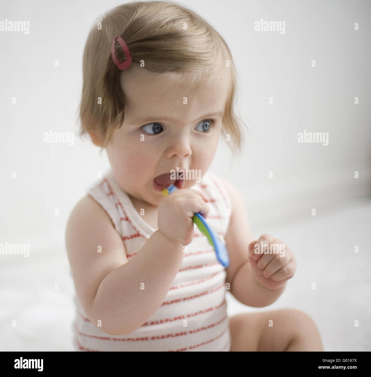 baby, cleaning her teeth Stock Photo Alamy