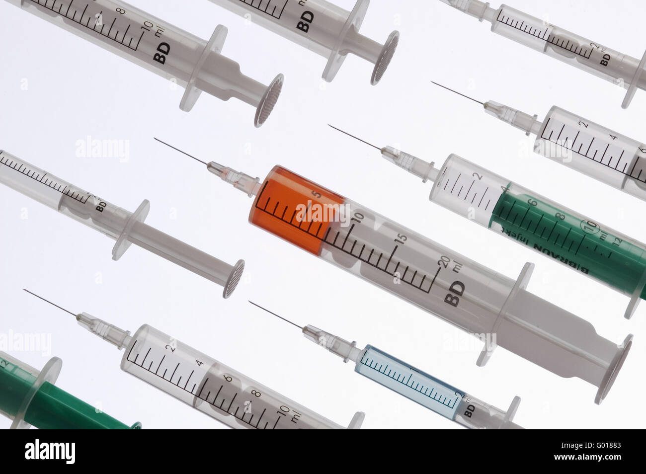 Syringes and butterfly Stock Photo - Alamy