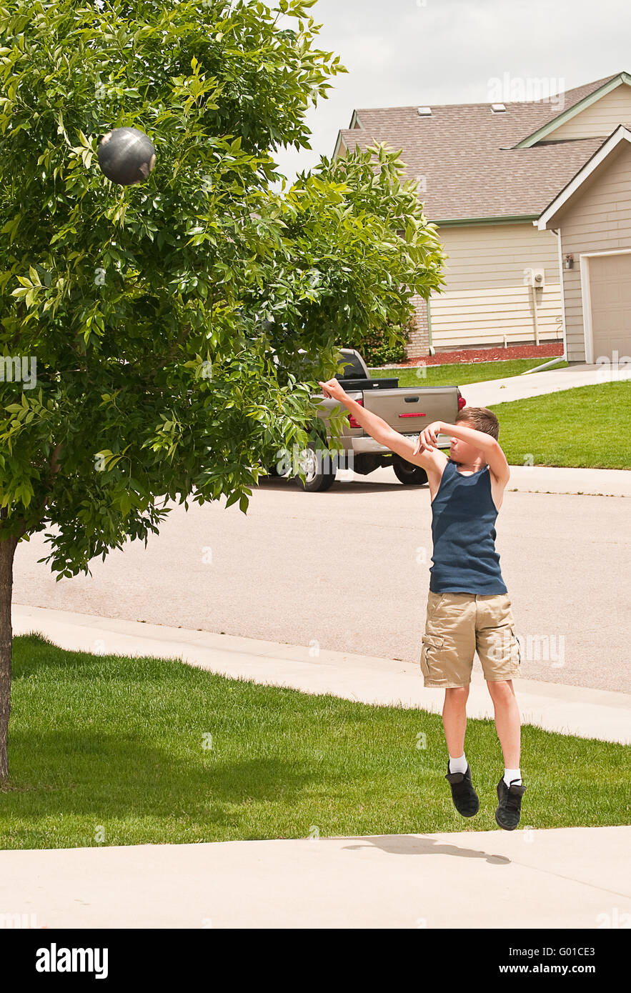 Shooting hoops at home Stock Photo Alamy