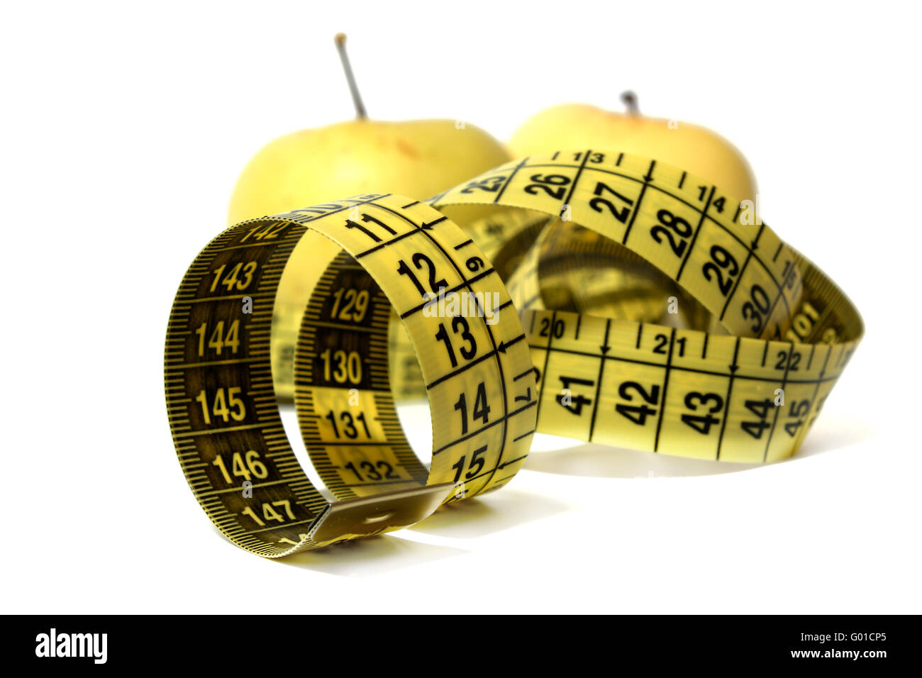 Apples tighten with measure tape isolated on white Stock Photo Alamy