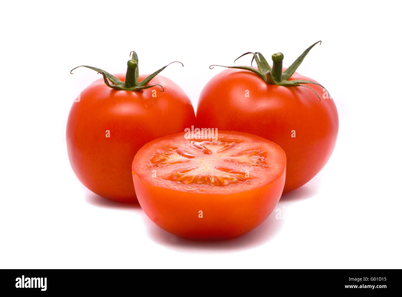 Fresh tomatoes. Macro studio isolated on white. Stock Photo