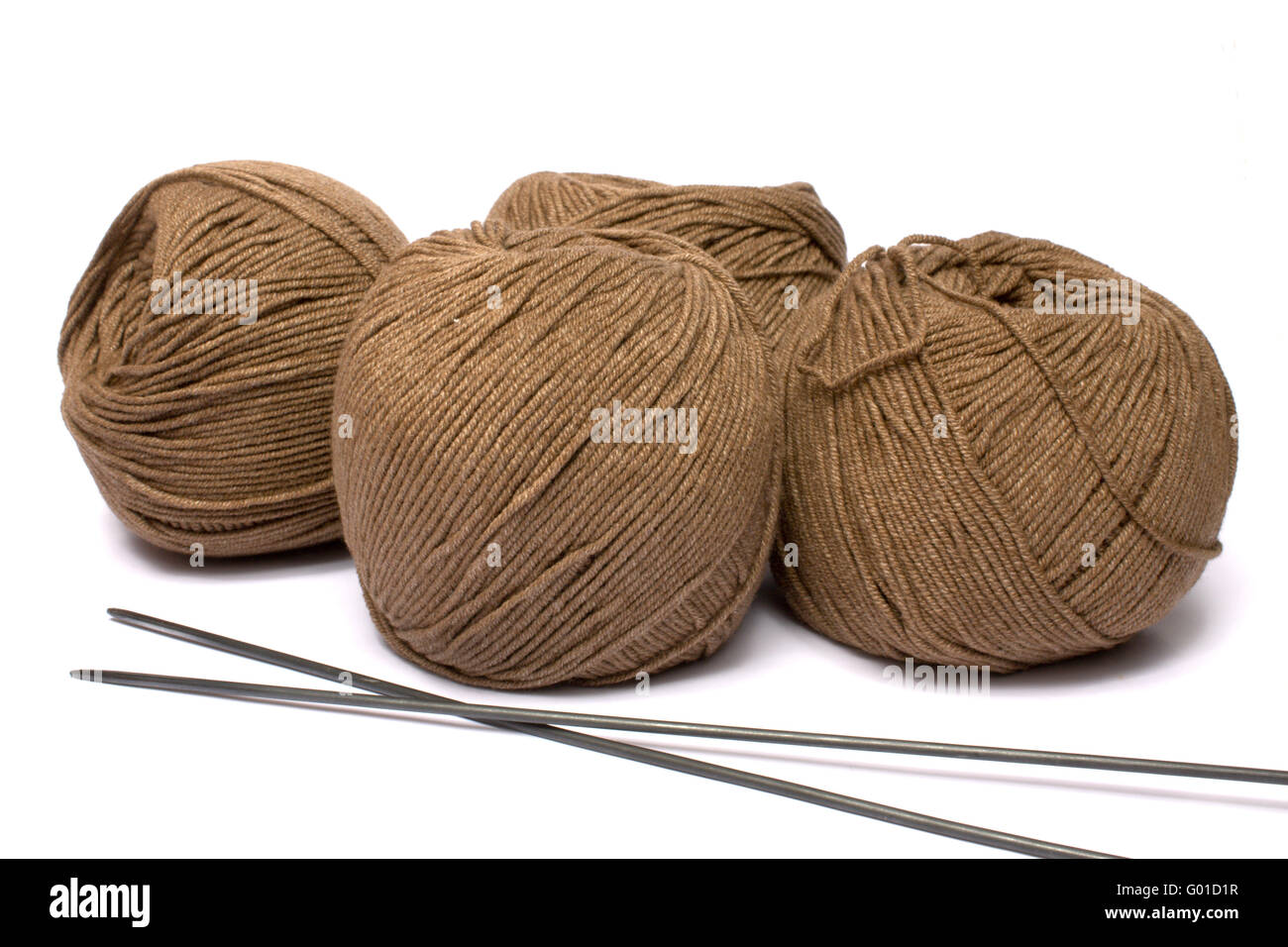 Yarn and spokes for knitting on a white background it is isolated Stock Photo