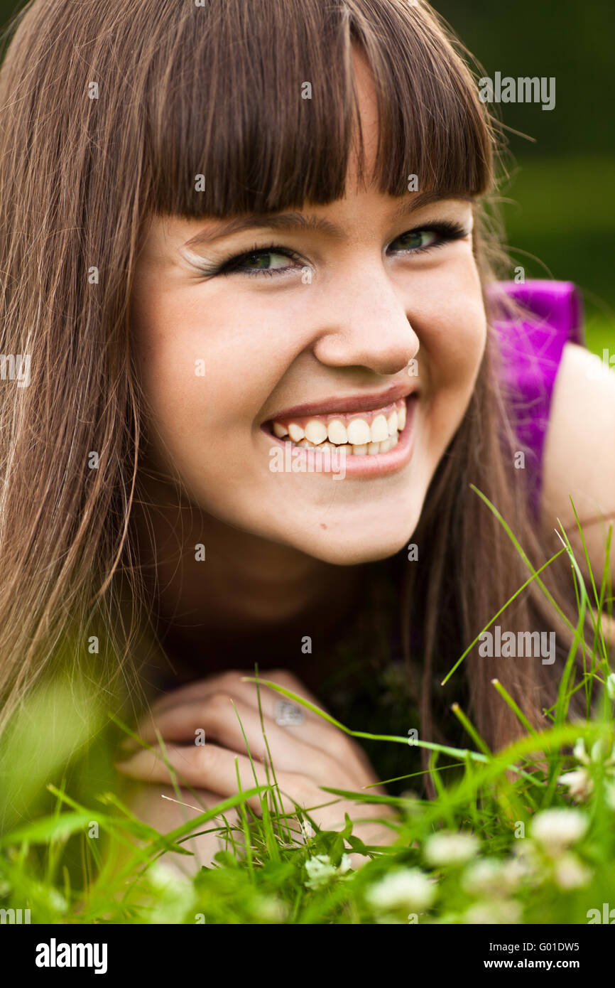 Portrait of pretty smiling girl with long brown hairs Stock Photo - Alamy