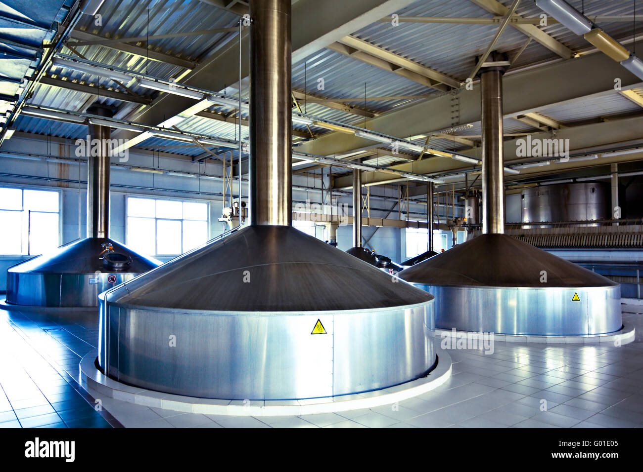 On the territory of brewer's plant with steel fermentation vats Stock