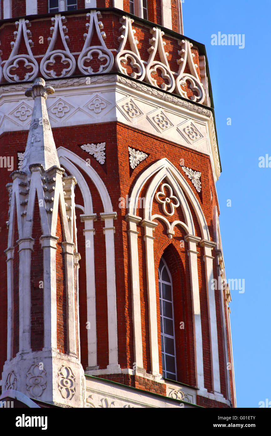 Fragment of the tower of red brick with white carved stone. Moscow Kremlin Stock Photo