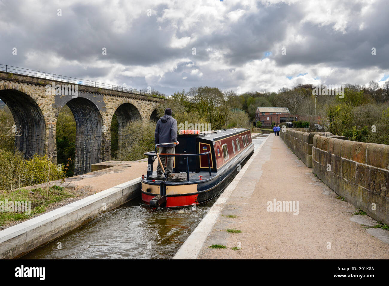 A canal boat crossing the aquaduct at Marple on the Peak Forest canal. Stock Photo