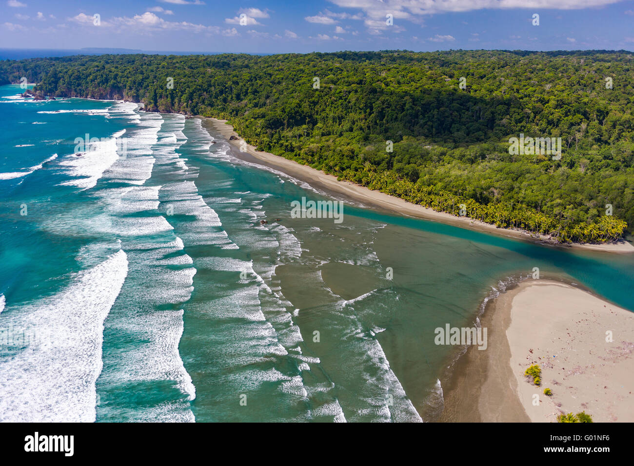 CORCOVADO NATIONAL PARK, COSTA RICA - Rio Claro empties into Pacific Ocean, Osa Peninsula rain forest. Stock Photo