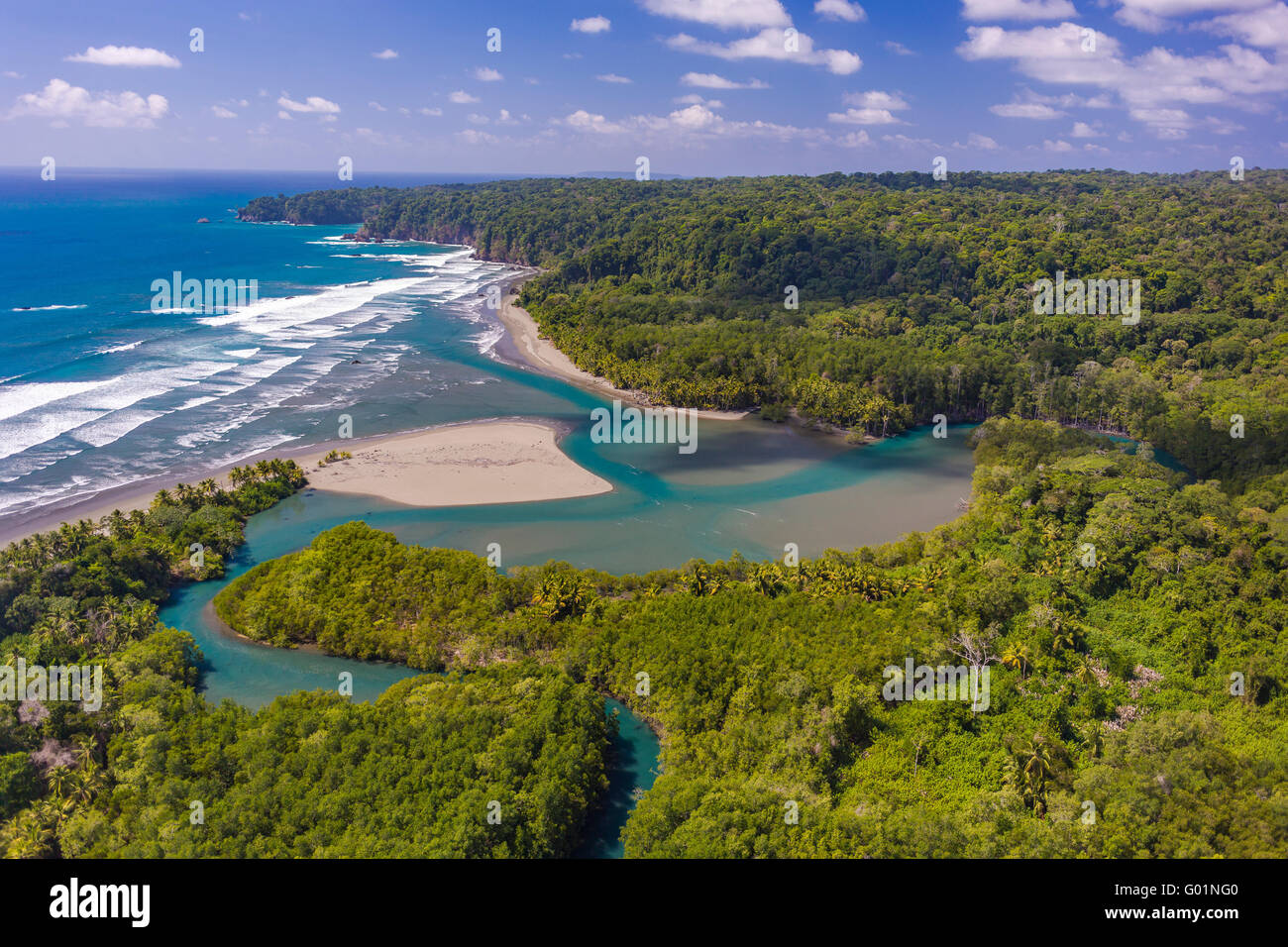 CORCOVADO NATIONAL PARK, COSTA RICA - Rio Claro empties into Pacific Ocean, Osa Peninsula rain forest. Stock Photo