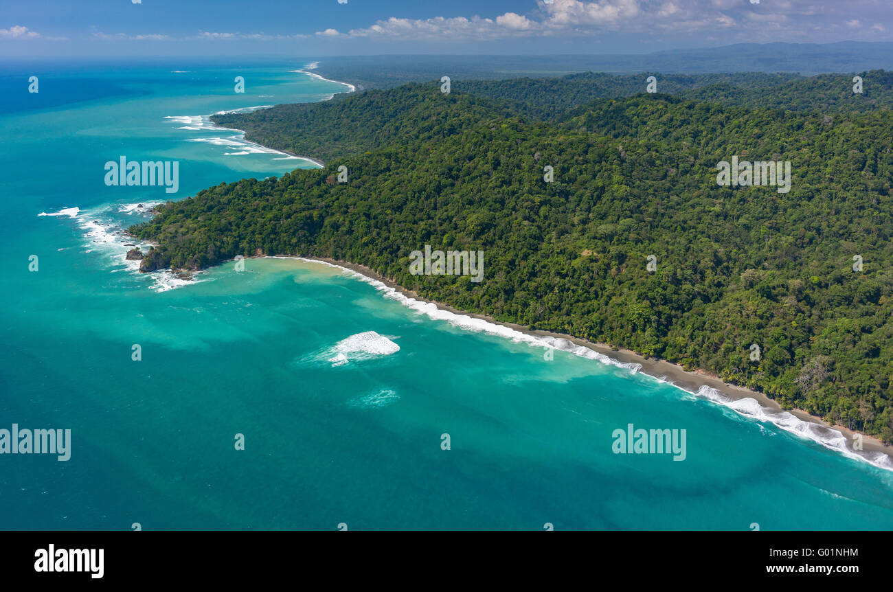 CORCOVADO NATIONAL PARK, COSTA RICA - Aerial of Osa Peninsula rain forest and the Pacific Ocean. Stock Photo