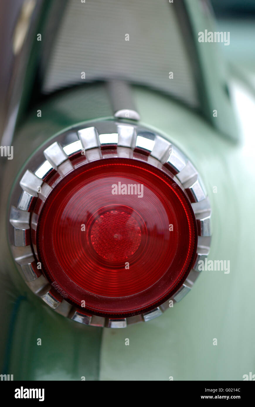 Red rear light of a turquoise Cadilac Oldtimer Stock Photo