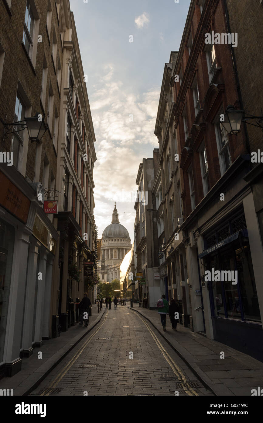 View of St Paul's Cathedral London from Watling Street as the sun sets Stock Photo