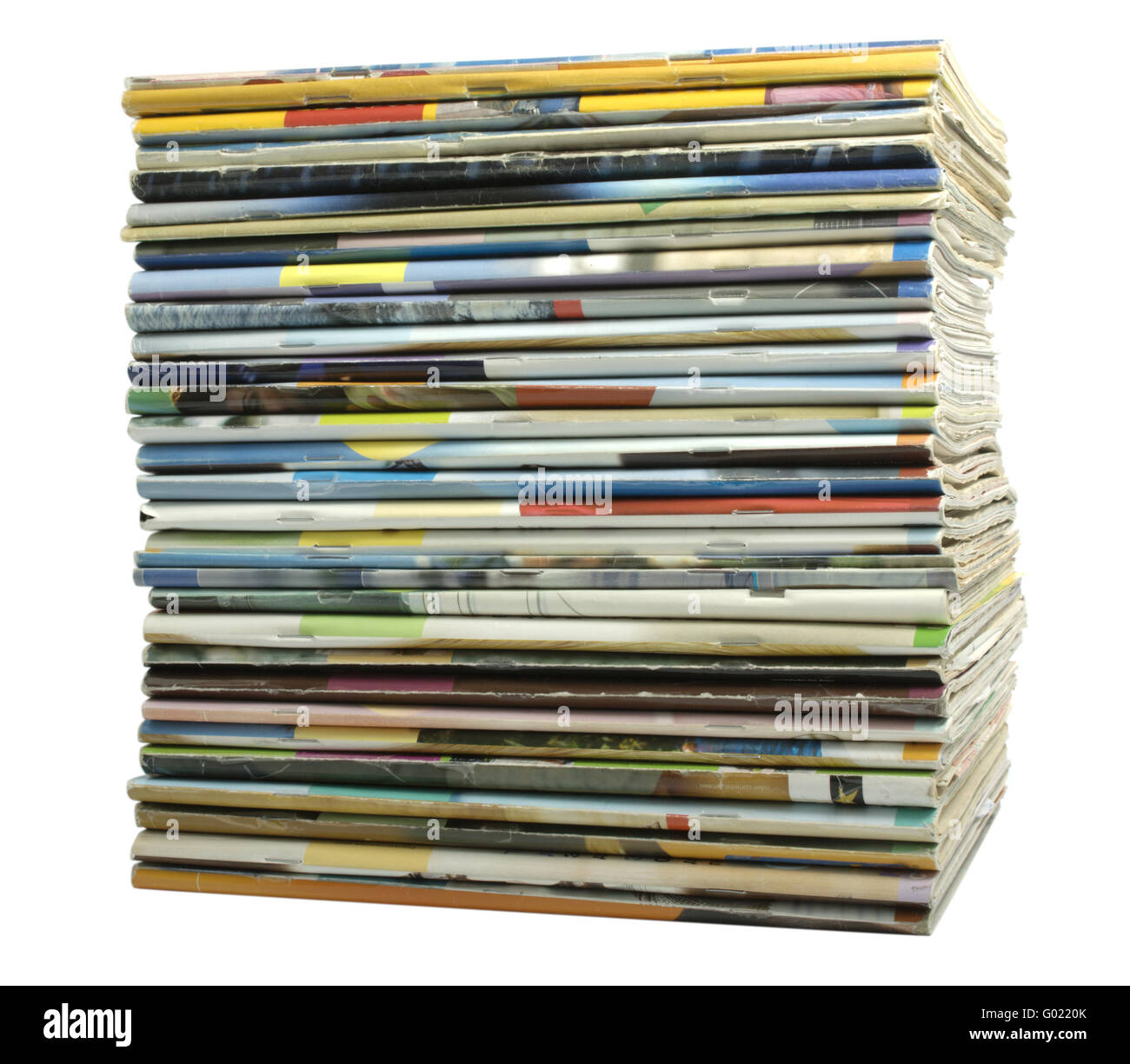 Heap of multi-coloured old magazines on a white background it is isolated Stock Photo