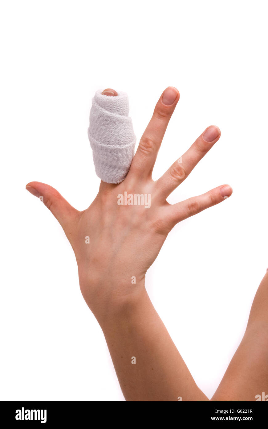 White medicine bandage on human injury hand finger. Studio isolated