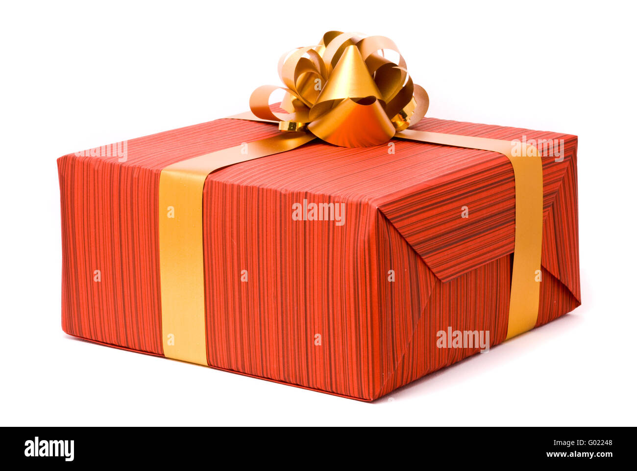 Red gift box with golden bow on a white background Stock Photo - Alamy