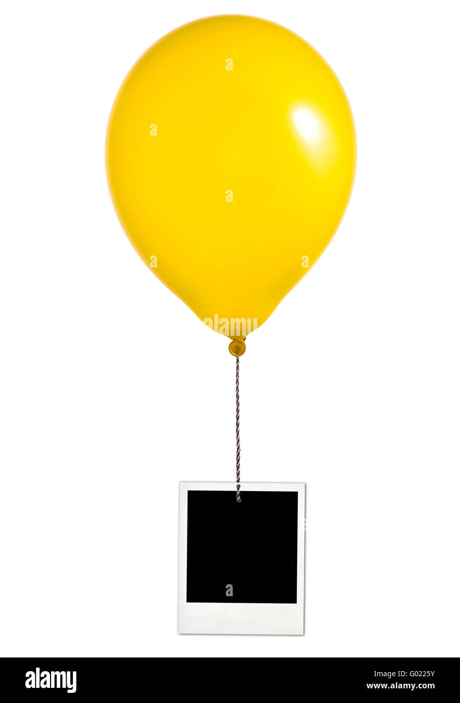 Yellow balloon and photo frame on white background Stock Photo