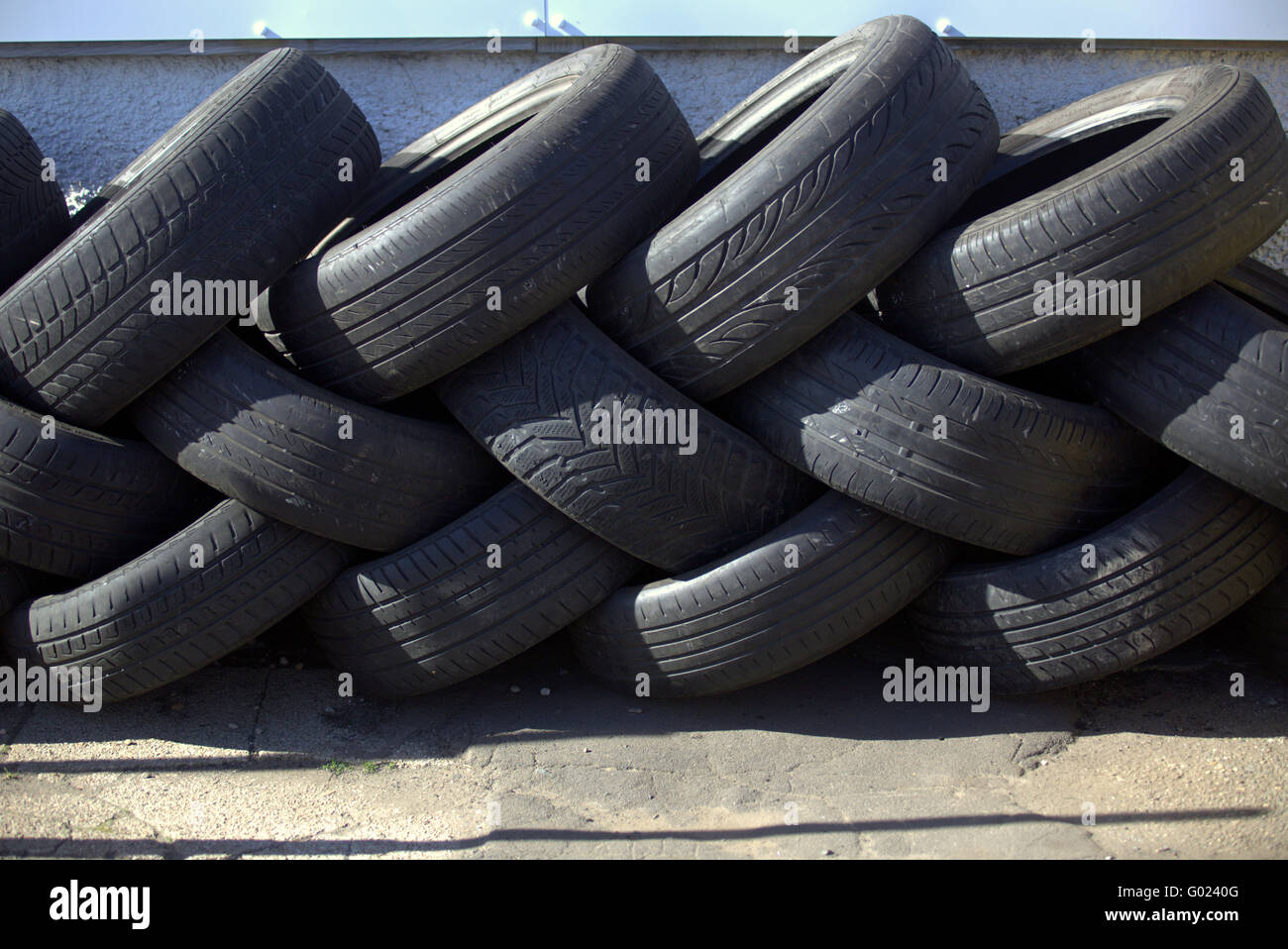 Stacked motor car  rubber tires tyres interleaved Stock Photo